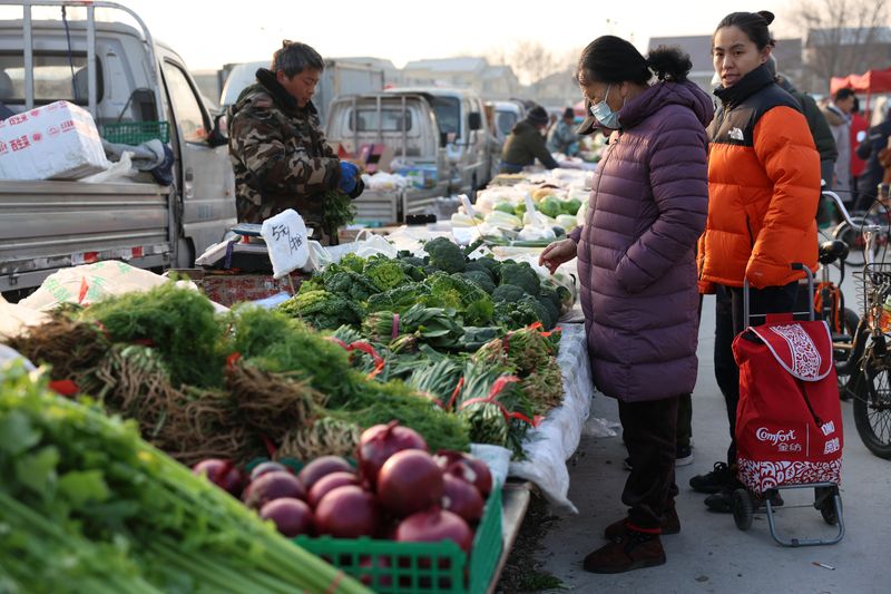 China's deflationary pressures build in Sept, consumer inflation cools