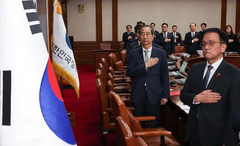 South Korea's acting president moves to reassure allies, calm markets after Yoon impeachment