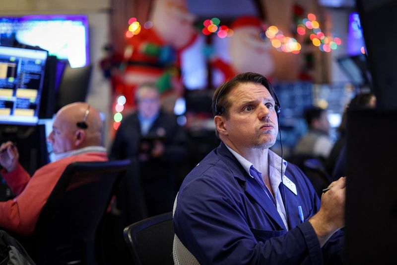 Stocks dive after Fed cuts rates, signals slower easing pace in 2025