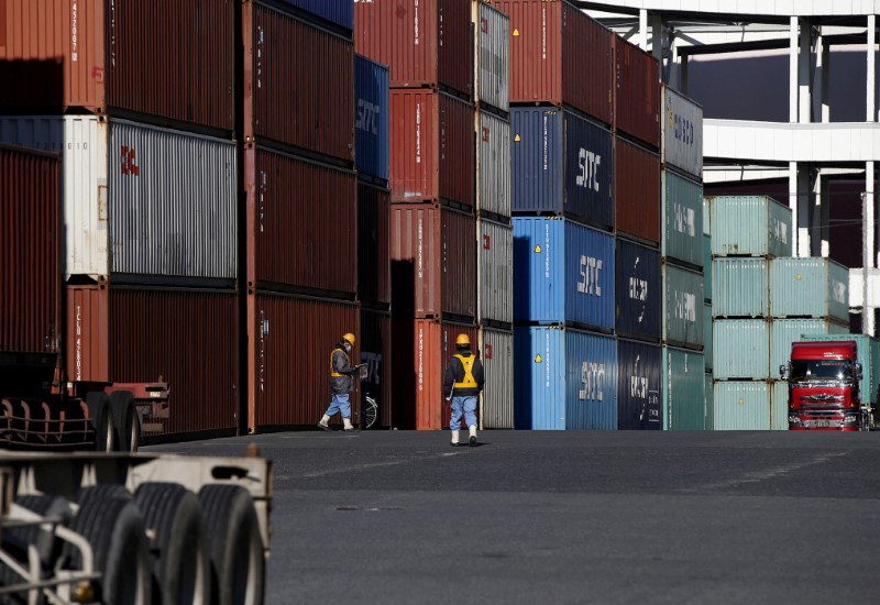 Japan's exports rise faster than expected, helped by weaker yen