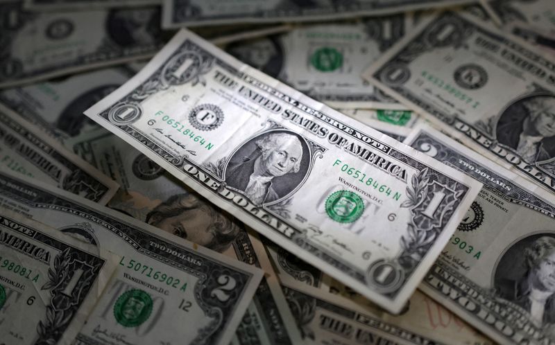 Dollar retreats on signs Trump tariffs to be measured